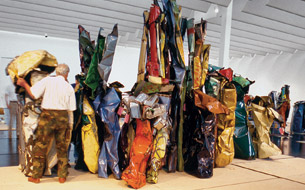 Chamberlain installing American Tableau (1984) at The Menil Collection, Houston, 1987